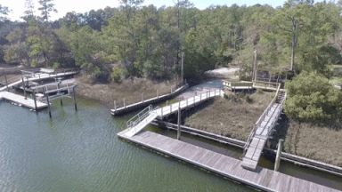 drone shot of private boat ramp and 77 foot dock